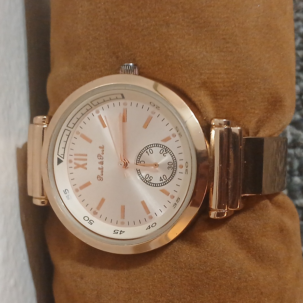 Peck & Peck rose gold tone with white face women's open cuff watch